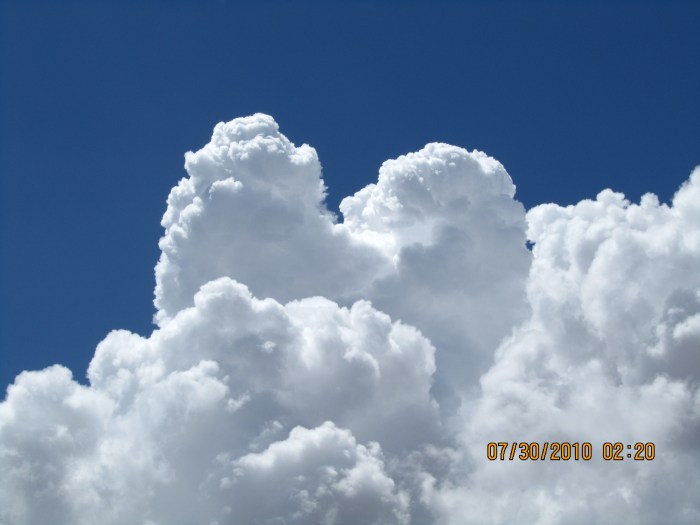 Puffy White Clouds, Blue Sky
